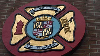 [photo, Anne Arundel County Fire Department emblem, 8495 Veterans Highway, Millersville, Maryland]